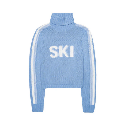 powder blue turtleneck sweater with "ski" letters in white and white stripe down the sleeves