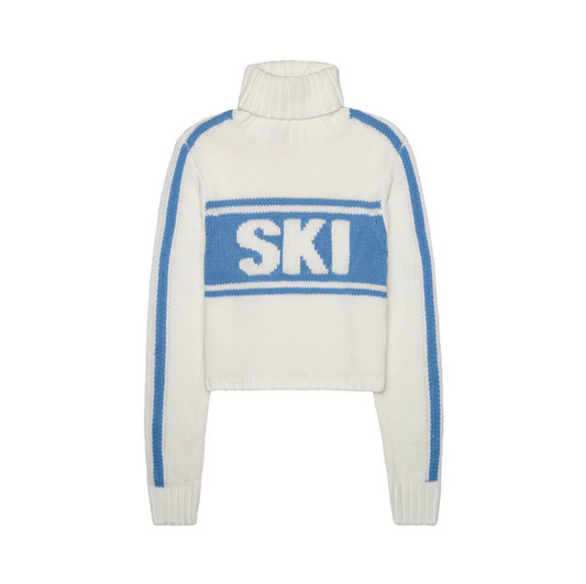 white turtleneck sweater with light blue "ski" letters and stripes down the sleeves