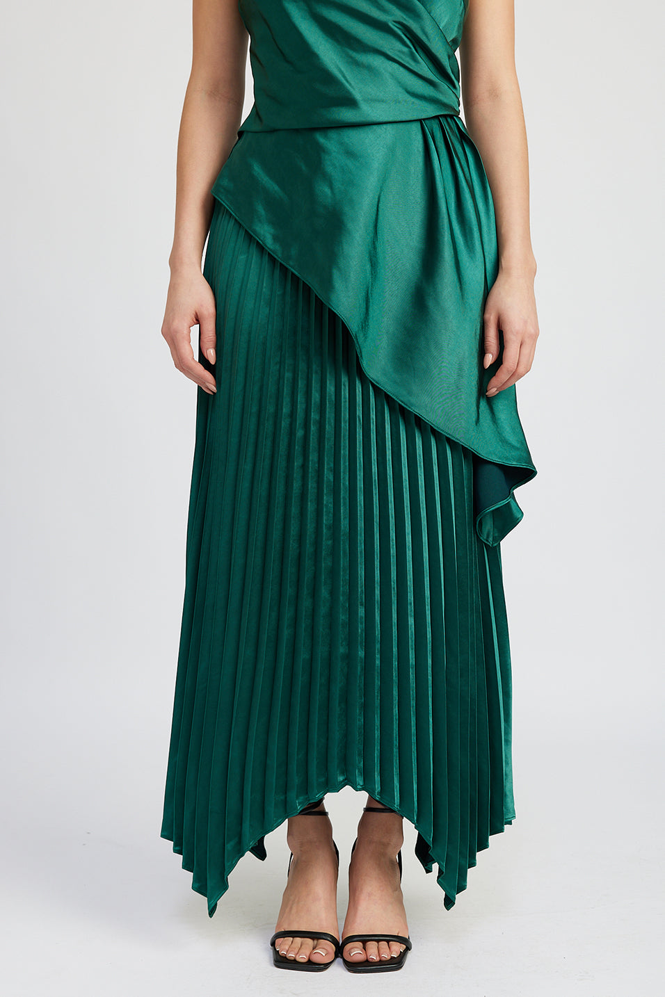 emerald green satin pleated midi skirt with asymetrical hem