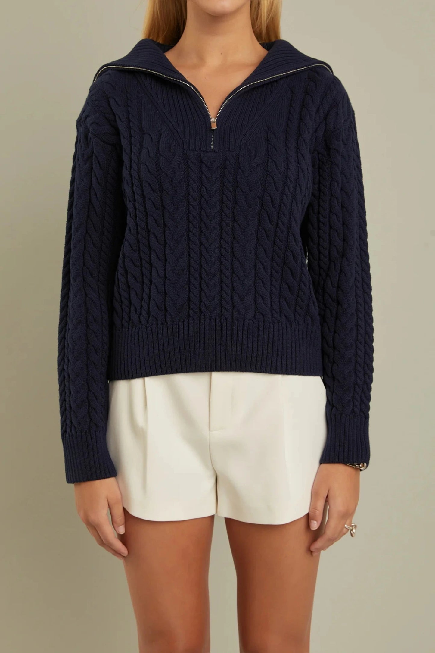 chunky navy cable knit sweater with long sleeves, quarter zip and sailor collar