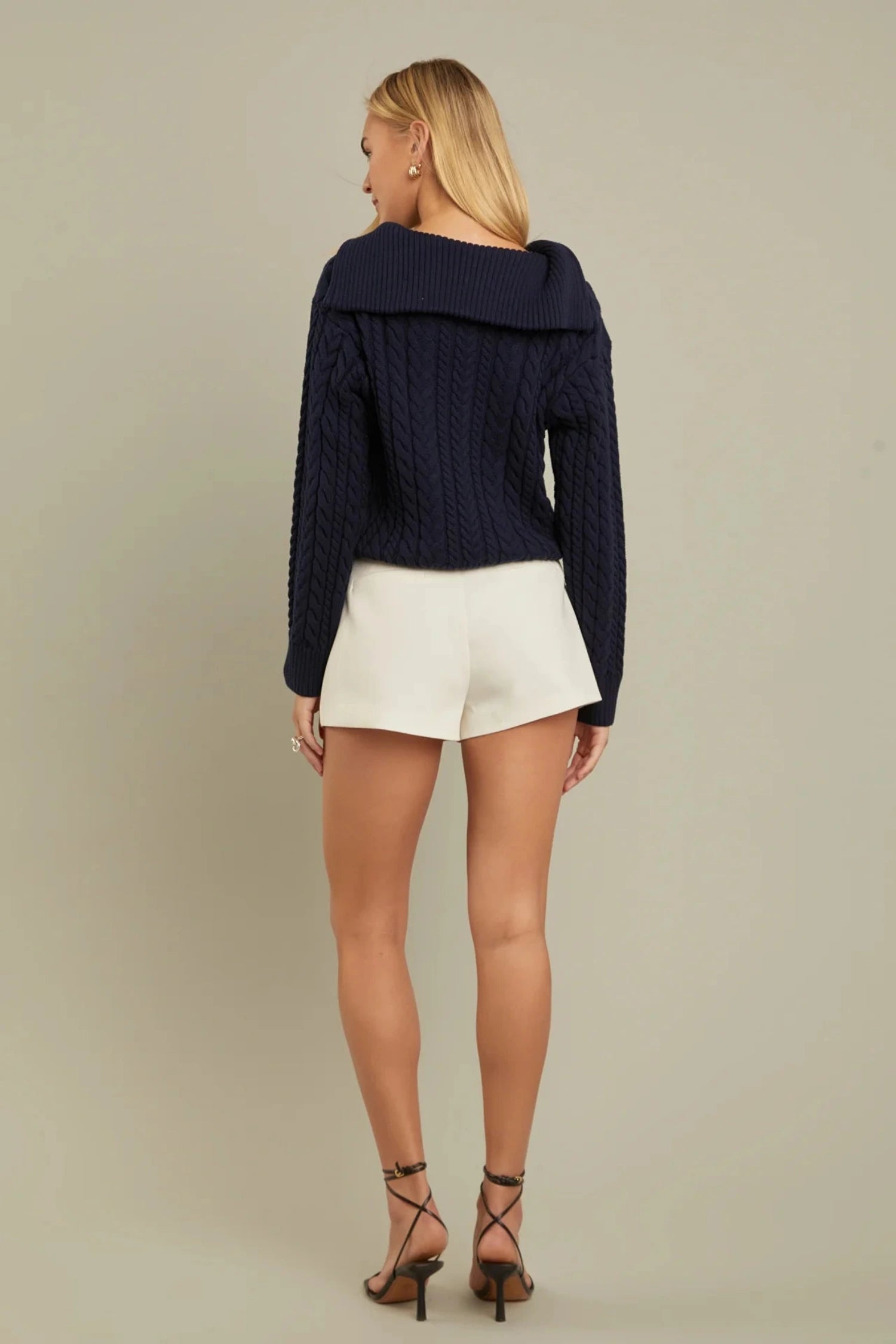 chunky navy cable knit sweater with long sleeves, quarter zip and sailor collar