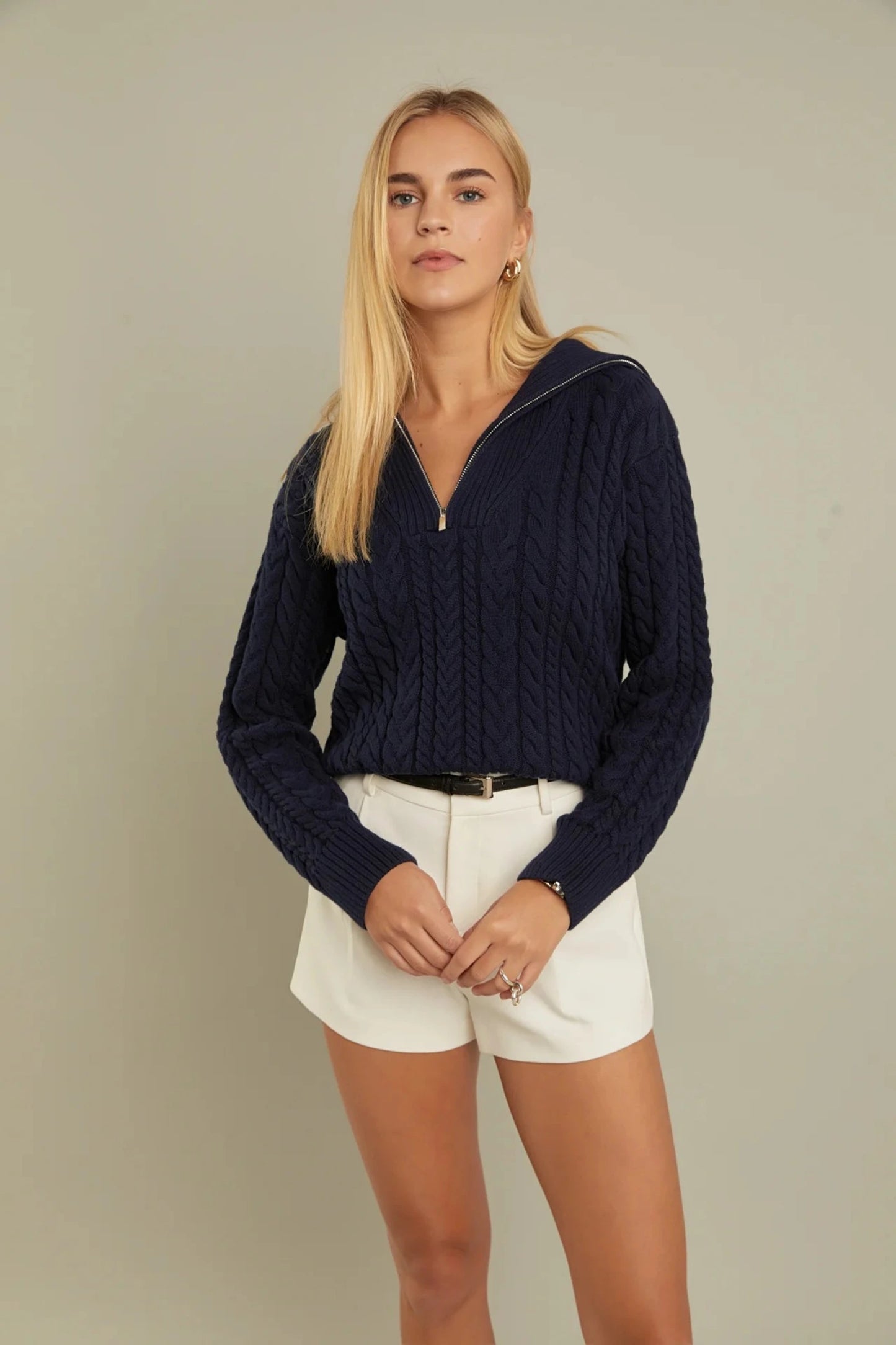 chunky navy cable knit sweater with long sleeves, quarter zip and sailor collar