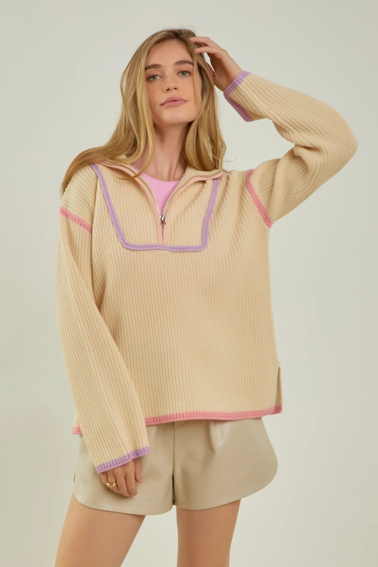 beige quarter zip pullover knit sweater with pink and purple piping