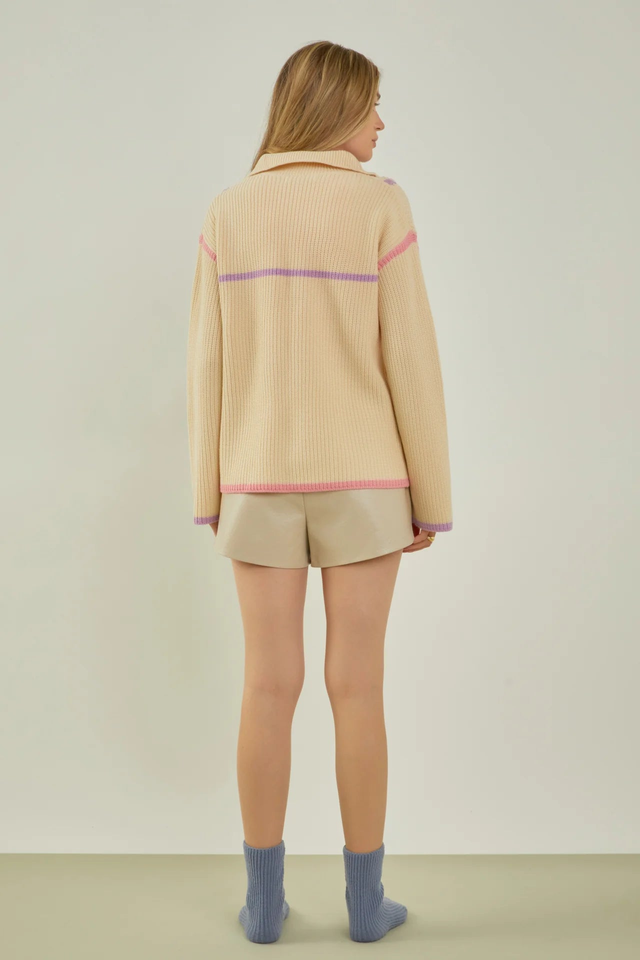 beige quarter zip pullover knit sweater with pink and purple piping