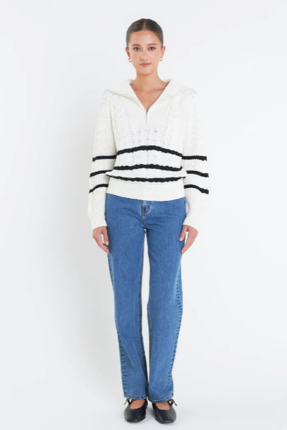 oversized white cable knit quarter zip pullover with 3 thin black stripes