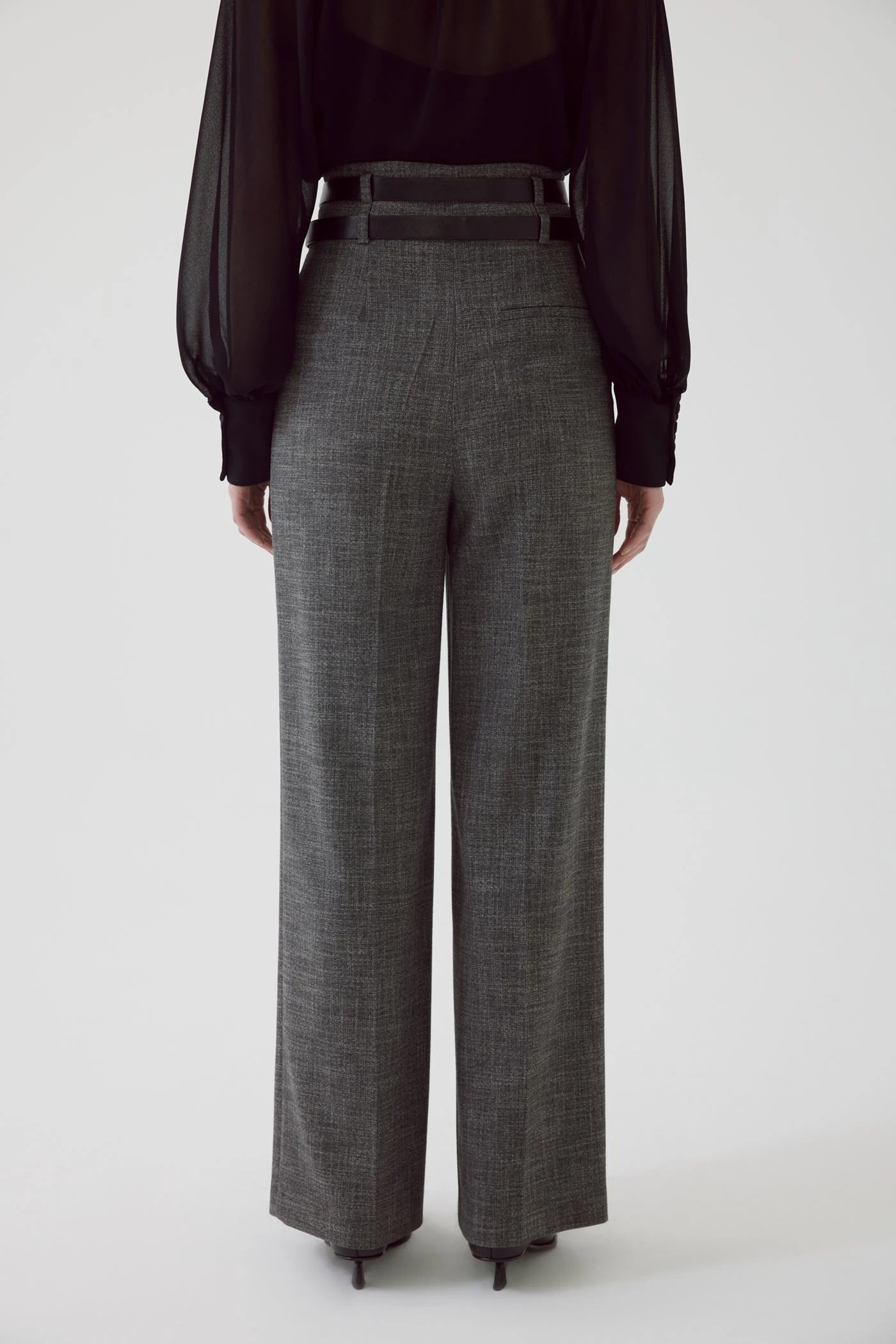 high waisted gray pleated slacks with double black belt