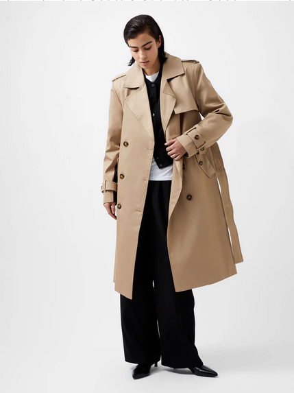 beige double-breasted trench coat with black stripe down the back