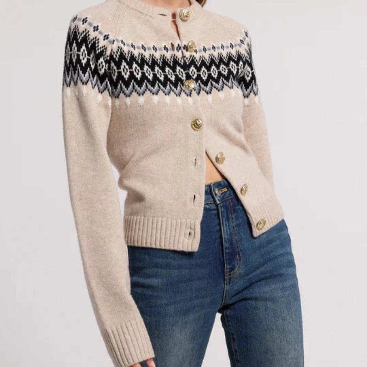 beige fair isle sweater with detailed gold buttons