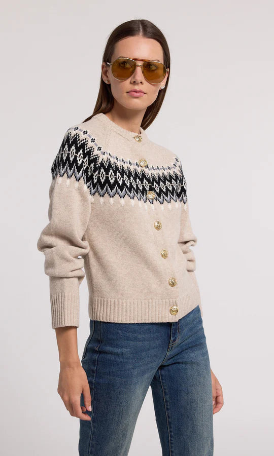 beige fair isle sweater with detailed gold buttons