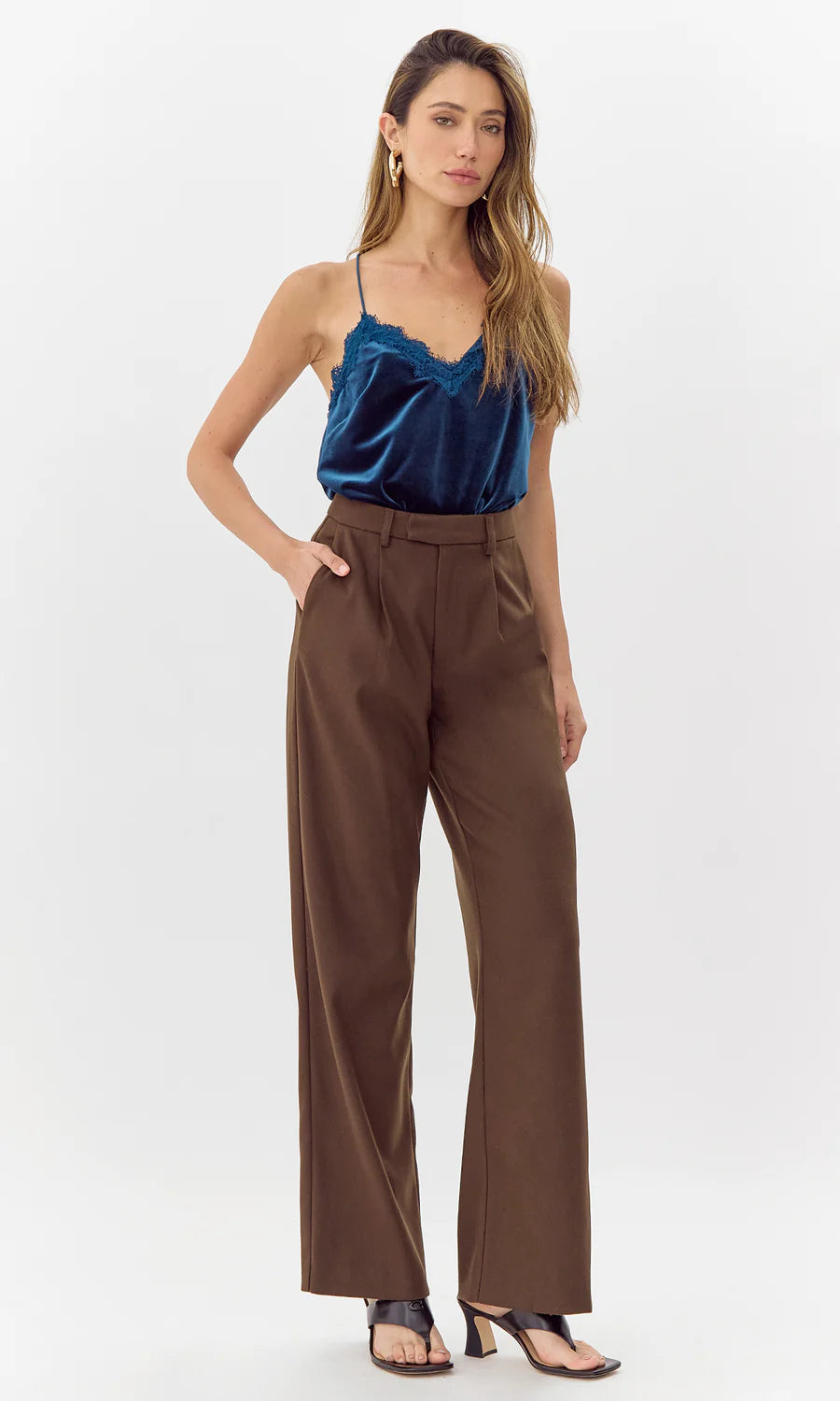 brown mid rise wide leg slacks with pockets and belt loops