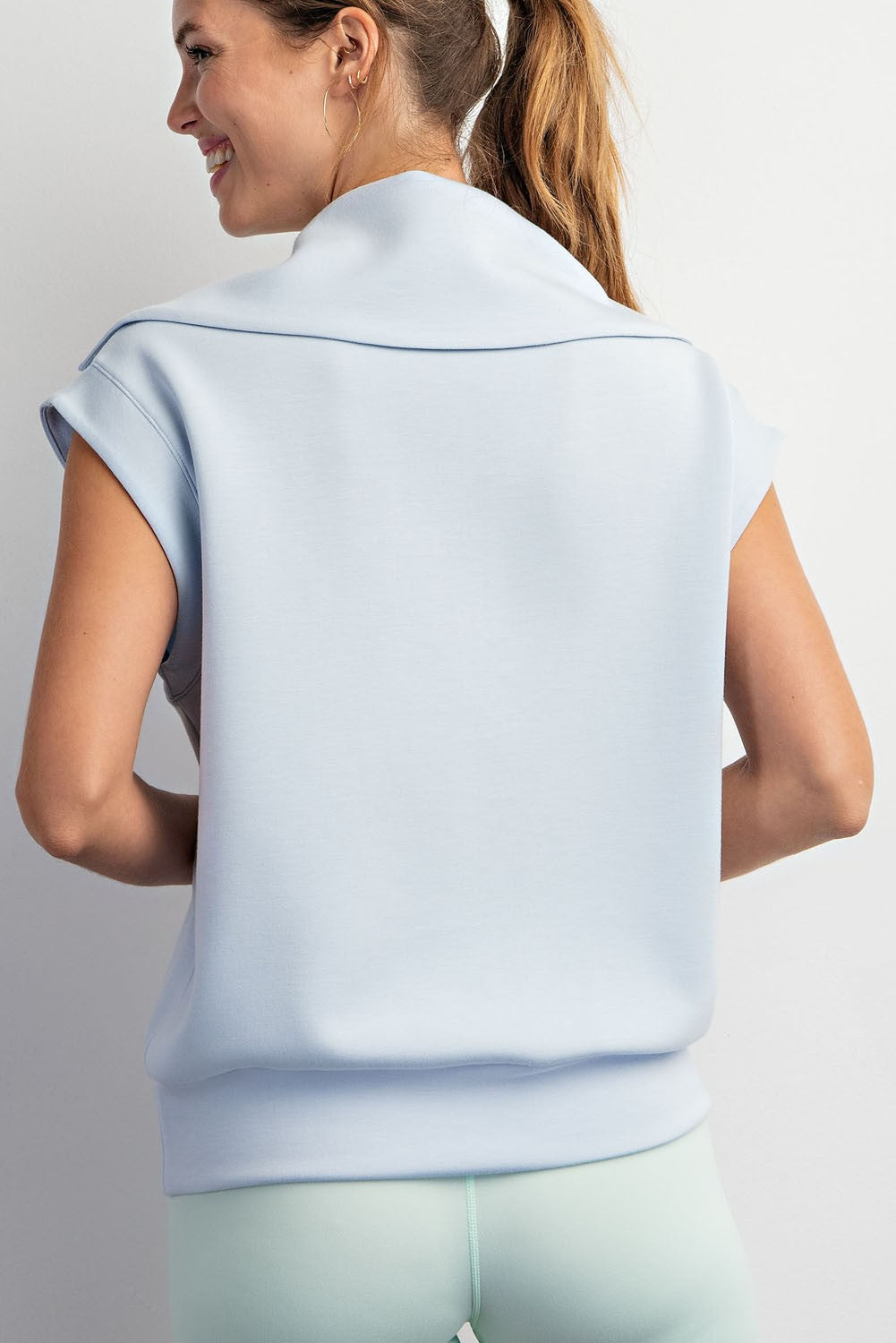 sleeveless cowl neck pullover quarter zip in pale blue