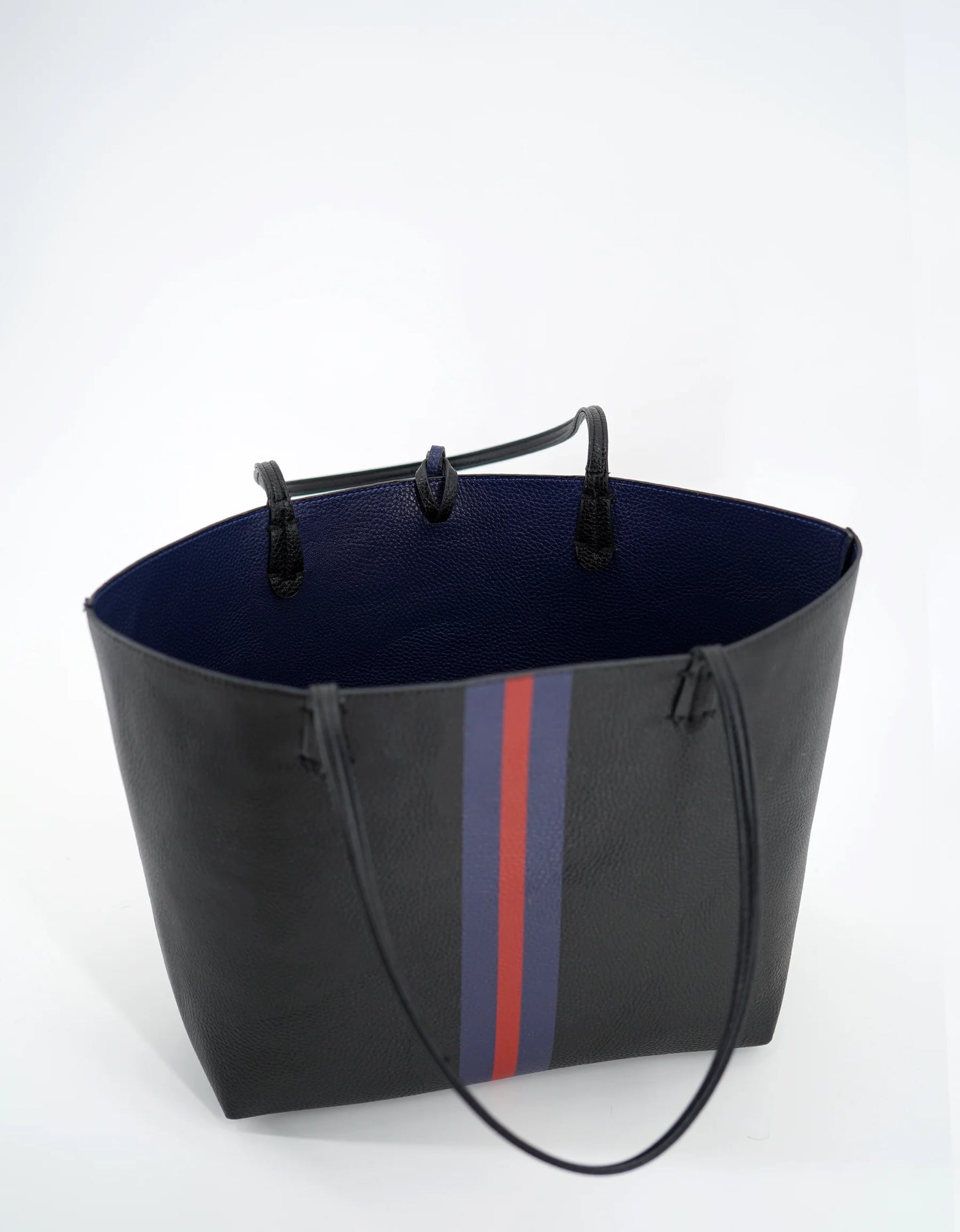 black shoulder purse with navy and red stripe