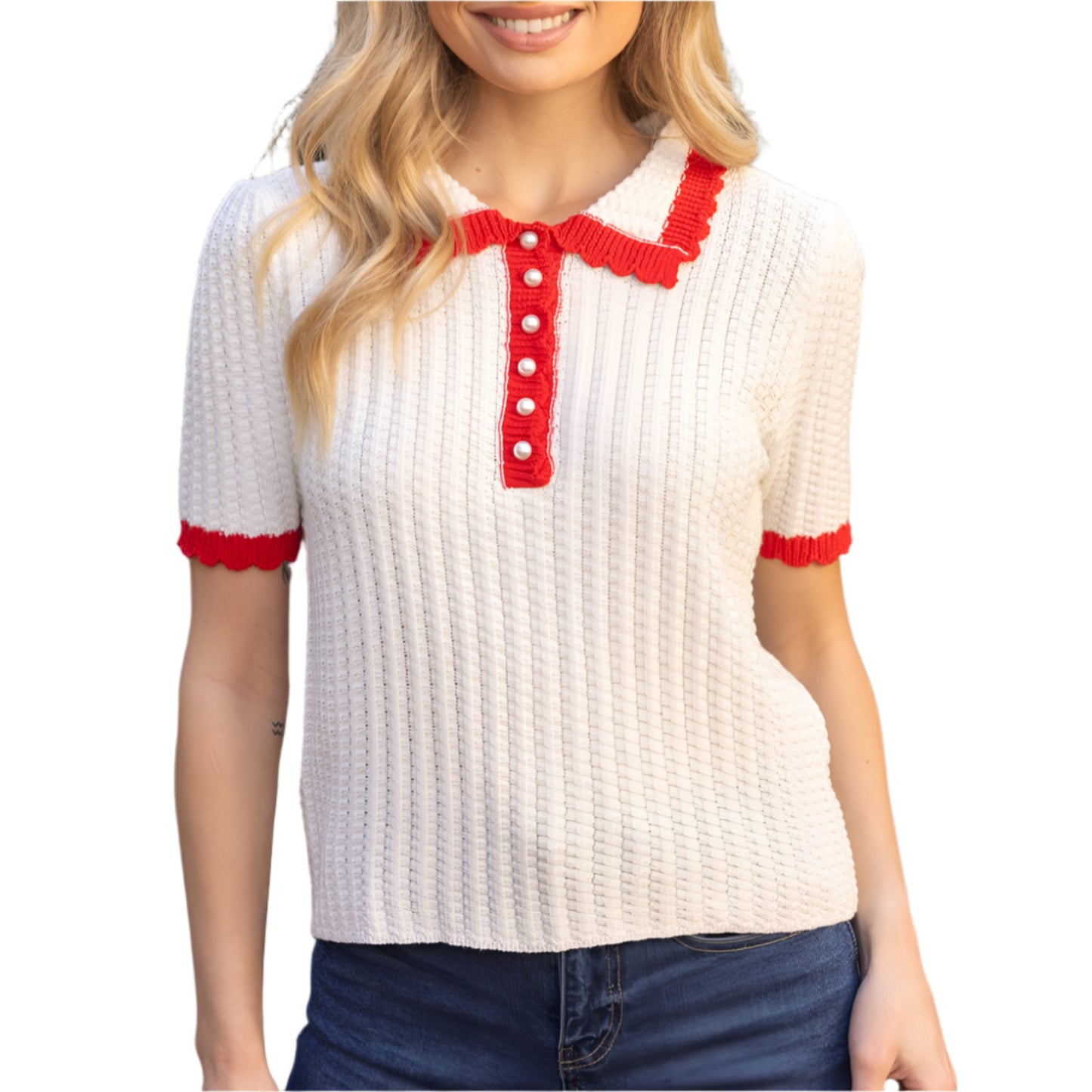 ivory knit short sleeve polo top with red trim, collar and pearl buttons